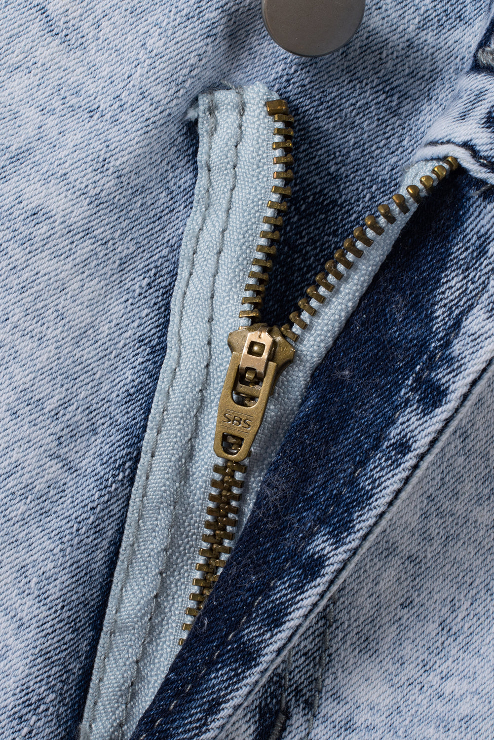 Light Blue Acid Wash Crossed Raw Edge Denim Shorts-Bella Boutique Collective