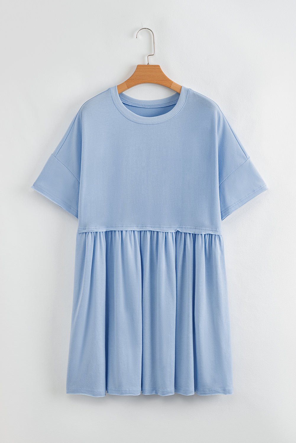 Sky Blue Solid Color Pocketed Raw Edge Babydoll Dress-Bella Boutique Collective