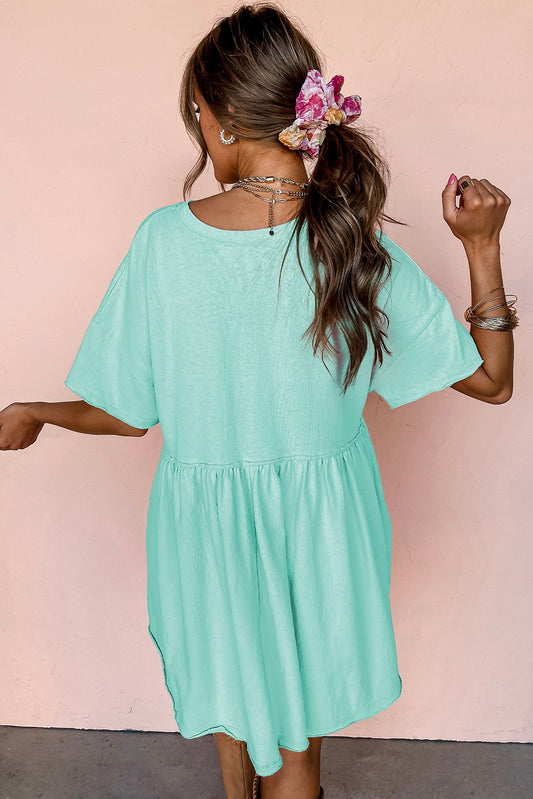 Moonlight Jade Solid Color Pocketed Raw Edge Babydoll Dress-Bella Boutique Collective