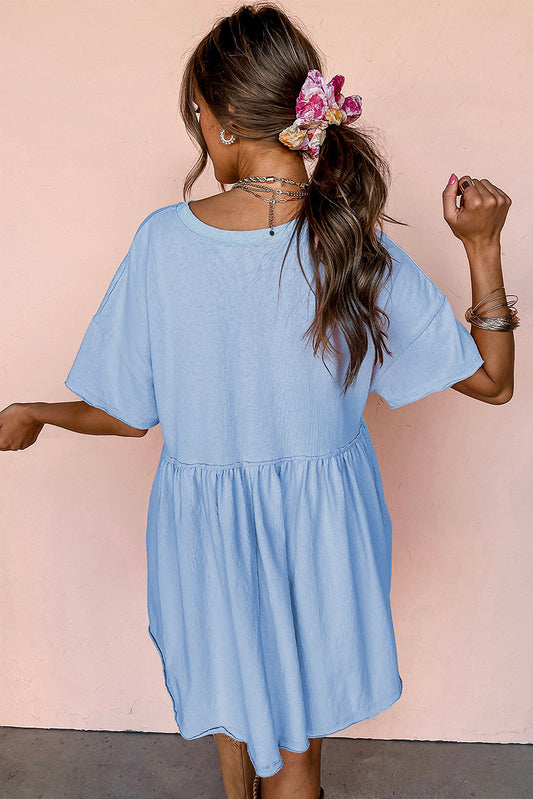 Sky Blue Solid Color Pocketed Raw Edge Babydoll Dress-Bella Boutique Collective