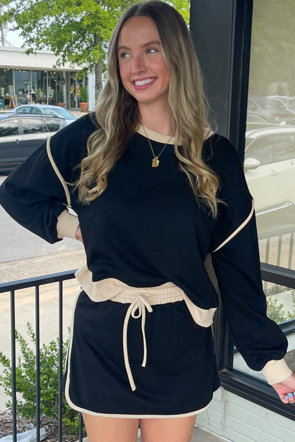 Black Color Contrast Loose Pullover and Lace-up Waist Skort Set-Bella Boutique Collective