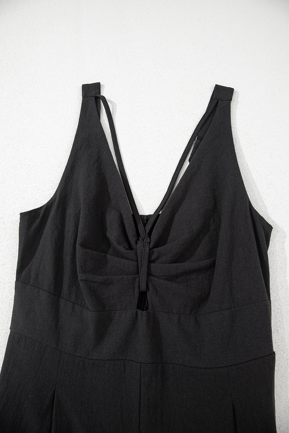 Black Front Cut Out Smocked Back Sleeveless Wide Leg Jumpsuit-Bella Boutique Collective