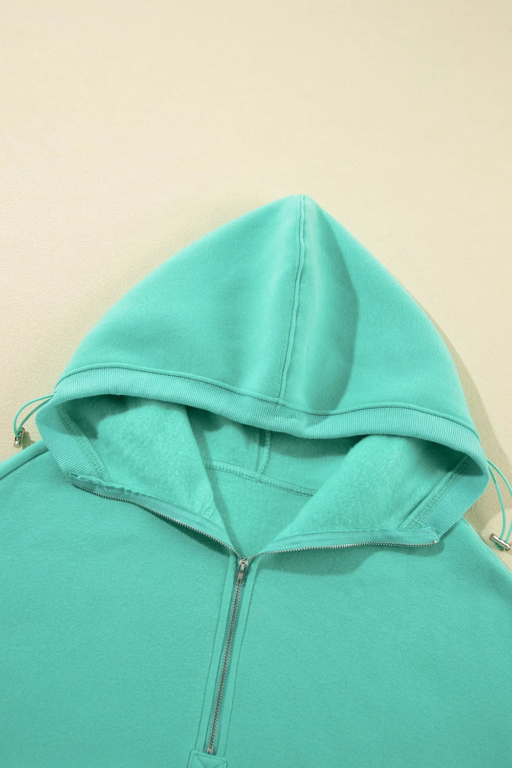 Pocketed Half Zip Long Sleeve Hoodie-Bella Boutique Collective